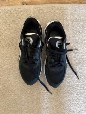 Puma Womans Black and White Casual Sneakers